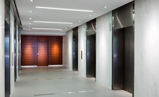 Lobby designed with contrasting mediums to emphasize entire space & create a complete composition.